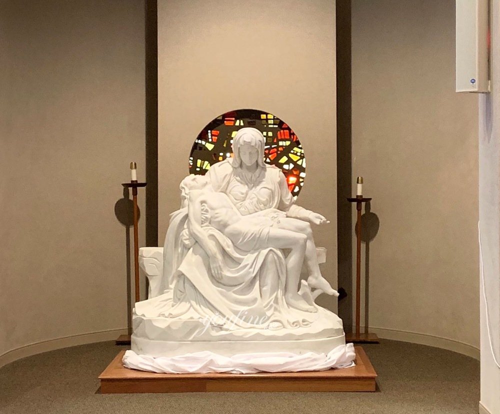 A sculpture of Pieta in a church