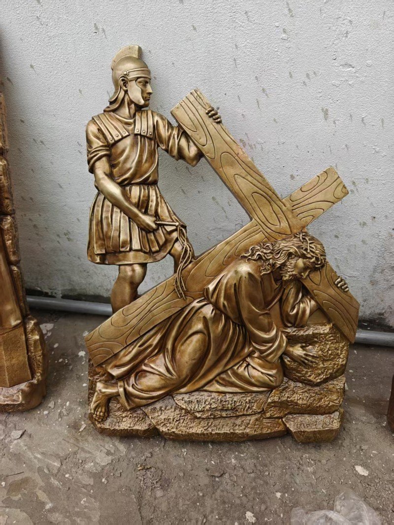 Gold-colored relief, Station IX — Jesus falls the third time